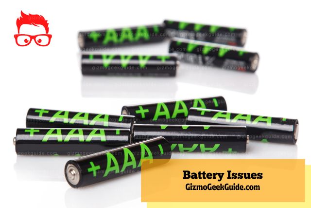 Pile of black AAA batteries